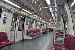 The maroon-colour interior of the Alstom Metropolis C830 train for the Circle Line.